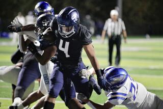 Dane Dunn scores on a three-yard run to give Sierra Canyon a 21-0 lead over Santa Margarita on Friday night.