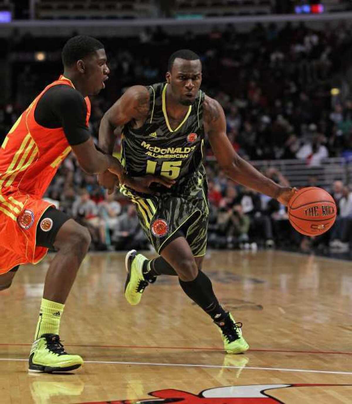 Shabazz Muhammad, right, accepted a scholarship to UCLA on Wednesday, apparently disappointing thousands of Twitter followers.