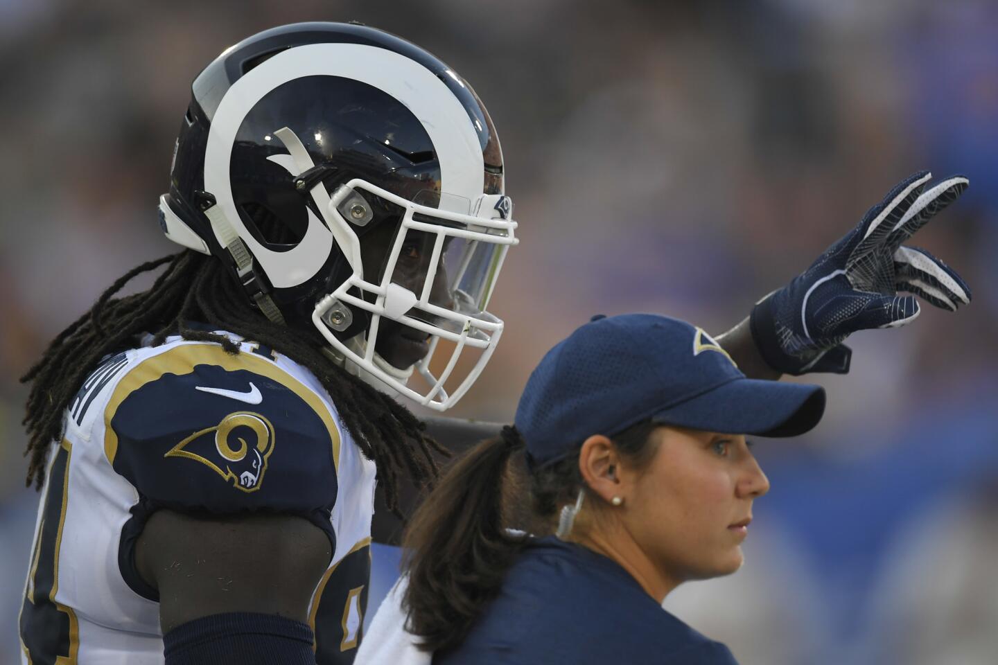 Los Angeles Rams tight end Temarrick Hemingway is helped by trainers after an injury during the first half of a preseason NFL football game against the Los Angeles Chargers Saturday, Aug. 26, 2017, in Los Angeles. (AP Photo/Mark J. Terrill)