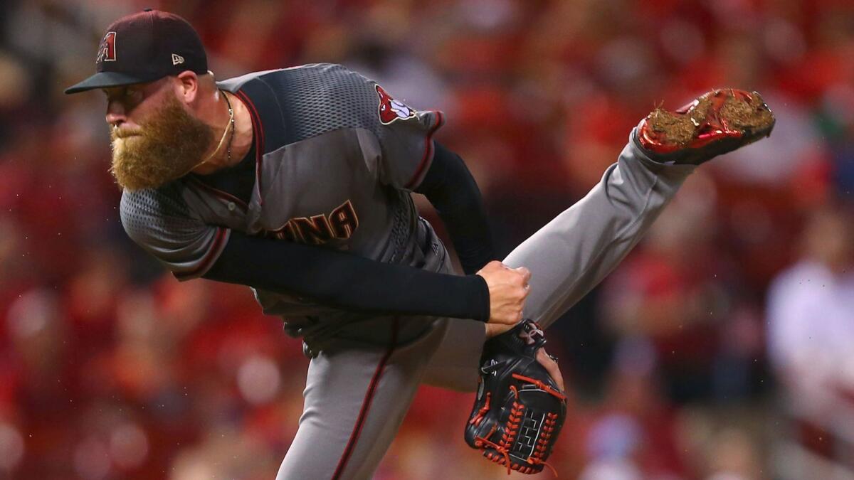 Arizona's Archie Bradley pitches against St. Louis on July 27.