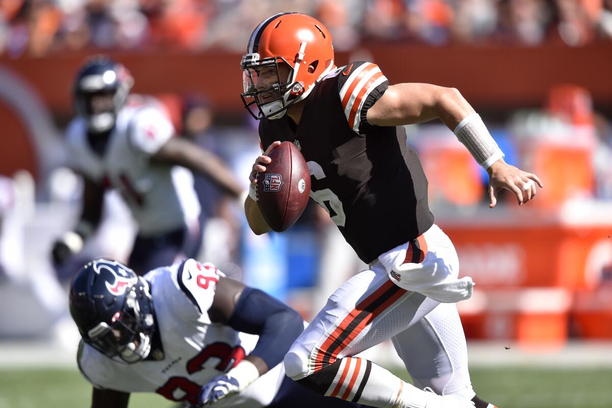 Cleveland Browns quarterback Baker Mayfield scrambles against the Houston Texans.