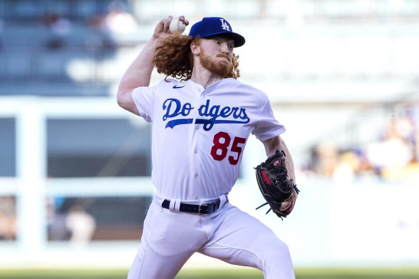 Los Angeles Dodgers starting pitcher Dustin May throws to a Miami Marlins batter during the first inning of a baseball game in Los Angeles, Saturday, Aug. 20, 2022. (AP Photo/Alex Gallardo)