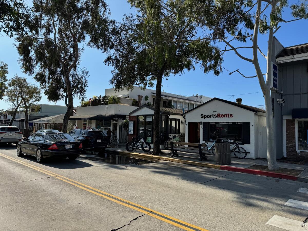 A street view looking at the 325 through 331 Marine Avenue properties that sold for $4.4 million on Balboa Island.