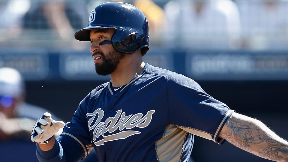 San Diego Padres outfielder Matt Kemp hits a single during an exhibition game against the Colorado Rockies on March 8.