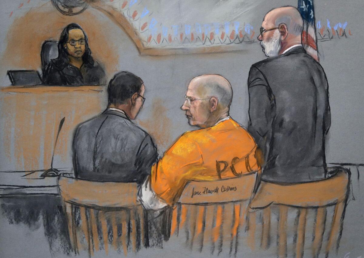 In this courtroom sketch from early June, James "Whitey" Bulger sits flanked by his defense team.