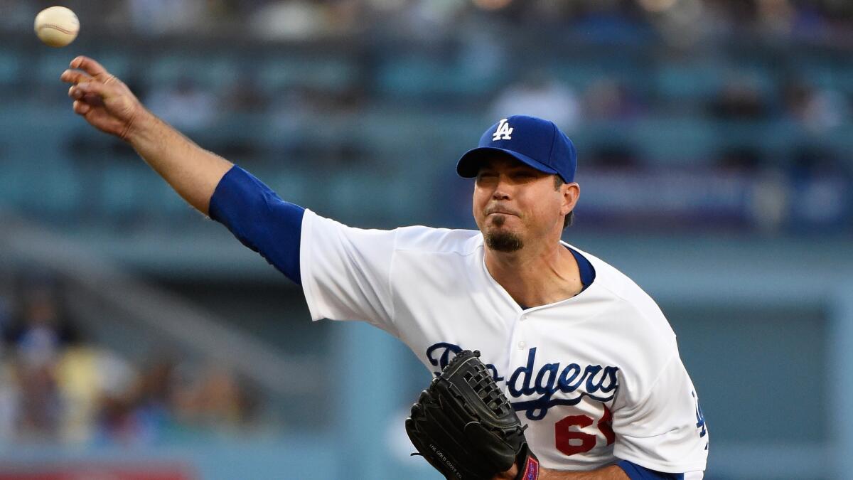 Dodgers starter Josh Beckett delivers a pitch during the first inning of the team's 2-1 loss to the Chicago White Sox at Dodger Stadium on Wednesday.