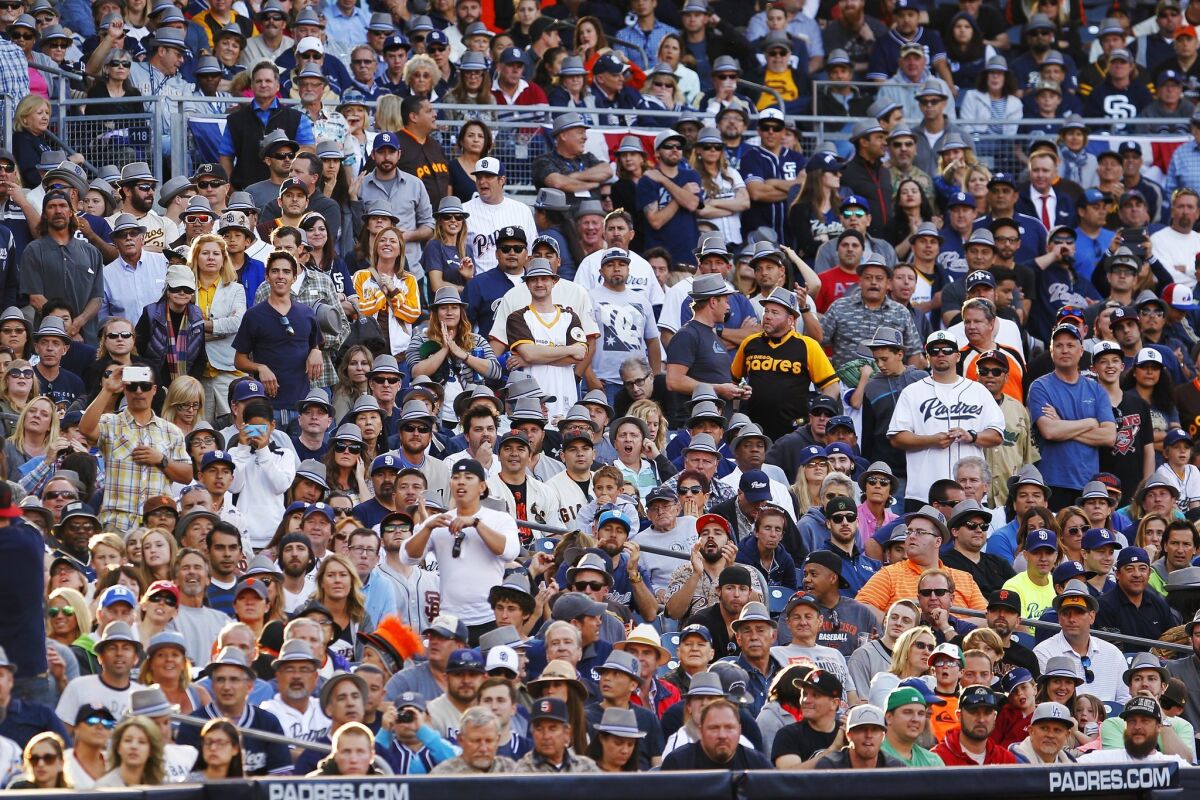 Fans watch during a game between the Padres and Giants in 2017.