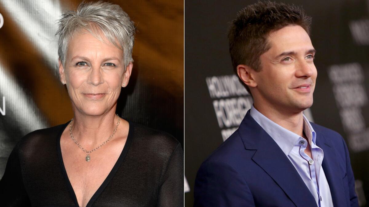 Jamie Lee Curtis and Topher Grace at the Hollywood Foreign Press Assn.'s Annual Grants Banquet on Aug. 13.