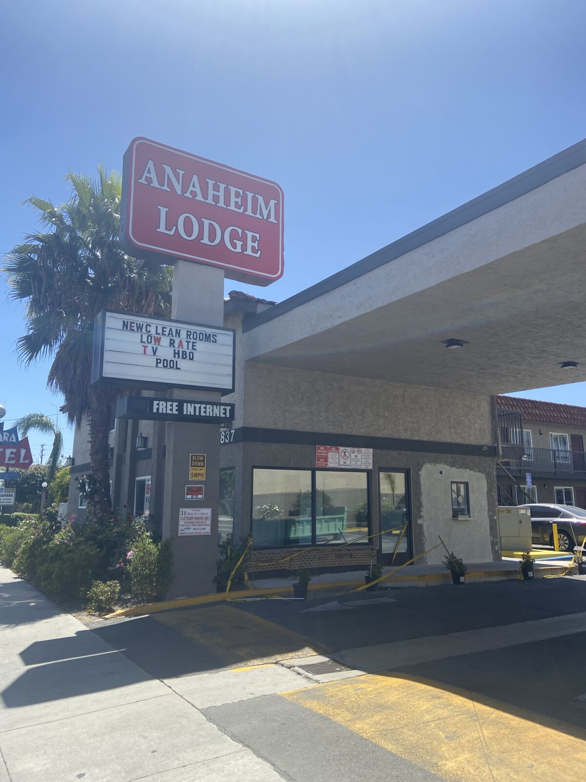 The driveway entrance of the Anaheim Lodge