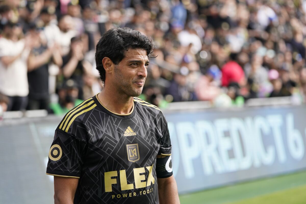 Los Angeles FC's Carlos Vela stands on the field during a match against the Colorado Rapids 
