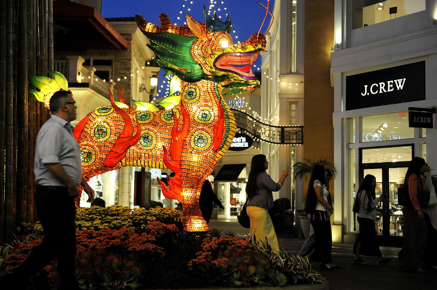 As Chinese New Year approaches, several Los Angeles-area malls are putting up decorations and arranging festivities and promotions around the holiday. Above, a dragon at the Grove.