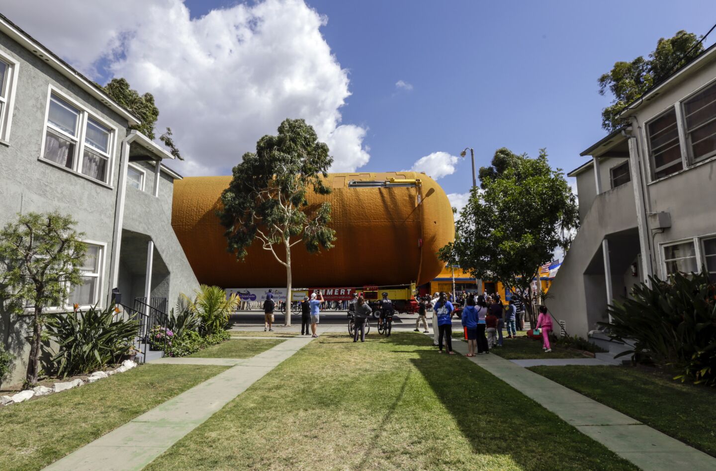 ET-94, NASA's last remaining space shuttle external tank, travels on Arbor Vitae Street in Inglewood on its way to the California Science Center on Saturday.