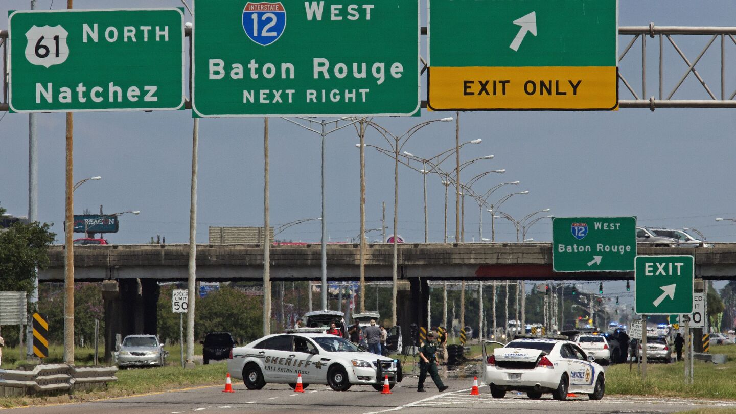 Authorities block Airline Highway in Baton Rouge, La., after six law enforcement officers were shot on Sunday morning.