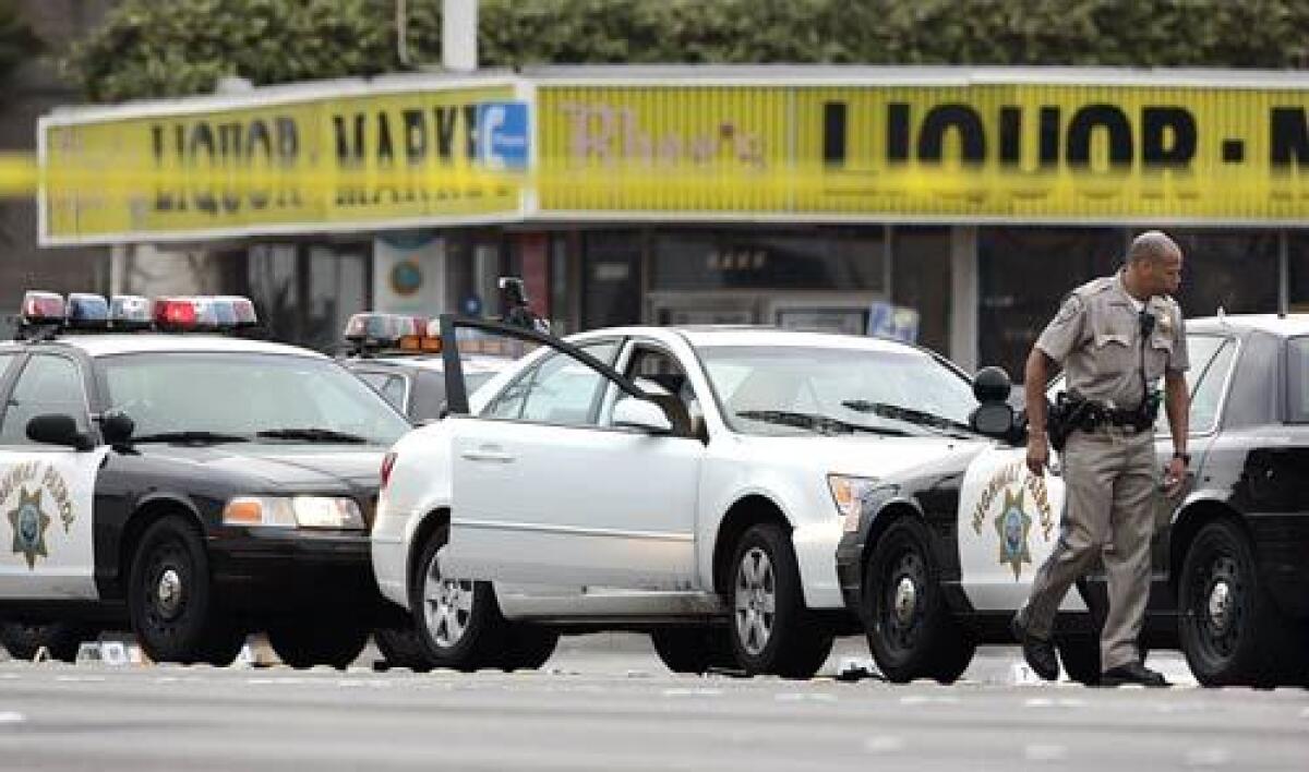 California Highway Patrol officers arrive in Gardena, where a man led police after a chase through Long Beach, Compton, West Los Angeles and downtown. The driver was arrested shortly after 4 a.m.