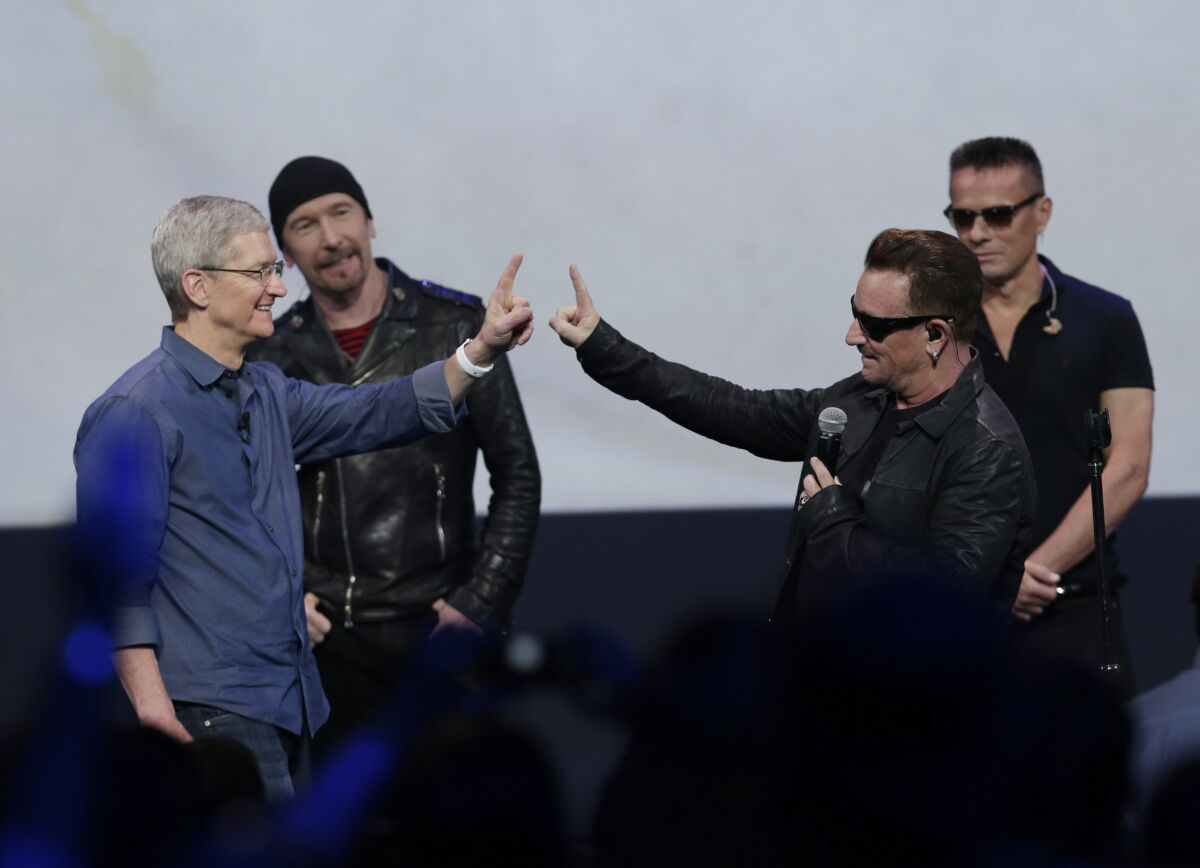 There are many reasons to feel annoyed by U2, particularly if you've decided to buy one of the group's albums over the last 15 years. But it seems unfair to hold the band solely accountable for its incursion into millions of iTunes libraries with a free copy of "Songs of Innocence," when it's U2's cuddly corporate partners that supplied the means. Annoyed by U2's reach? Wait until you see what other music Apple will no doubt also "give" to your collection.