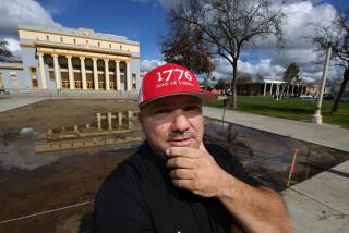 HANFORD CA FEBRUARY 21, 2024 - John Darpli, who is an alfalfa broker and softball coach, is president of the 1776 Sons of Liberty, shown in Civic Center Park where they are based in Hanford, Calif., Wednesday, Feb. 21, 2024. The Sons of Liberty are a grassroots, ultraconservative organization, who believe Democrats and liberals are endangering the U.S. Constitution. (Gary Kazanjian / For The Times)