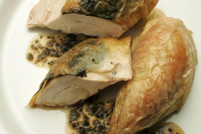 107705.FO.0216.food - Roasted chicken with truffles and truffle butter.