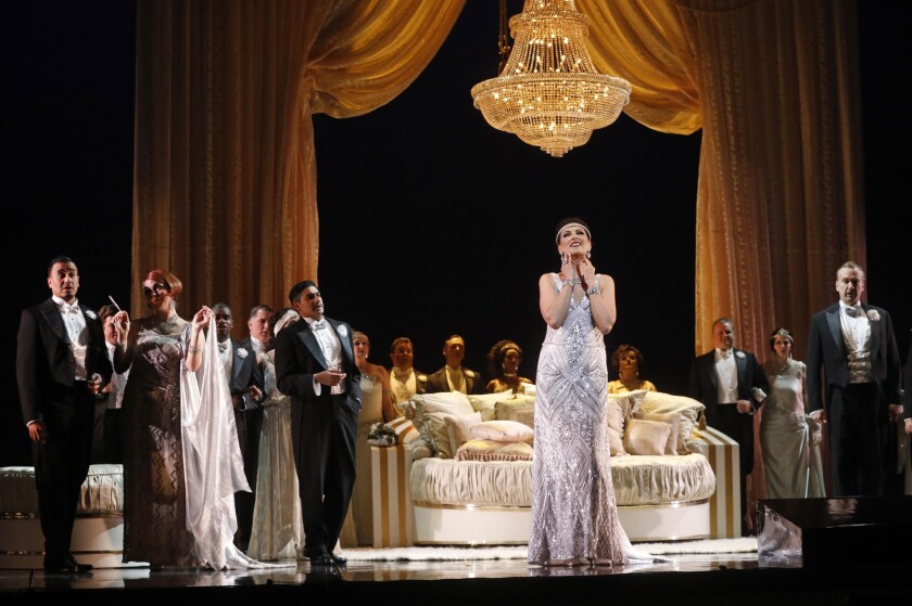 Adela Zaharia, center, stars as Violetta in Los Angeles Opera's flapper-era "La Traviata" directed by Marta Domingo at the Dorothy Chandler Pavilion.