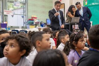 Valley Glen, CA - August 14: Los Angeles Unified School District Superintendent Alberto Carvalho, left, gestures during a visit with first graders at Coldwater Canyon Elementary on Monday, Aug. 14, 2023 in Valley Glen, CA. (Brian van der Brug / Los Angeles Times)
