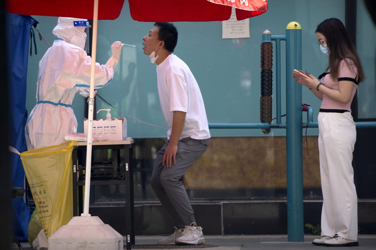 Man being swabbed for coronavirus test