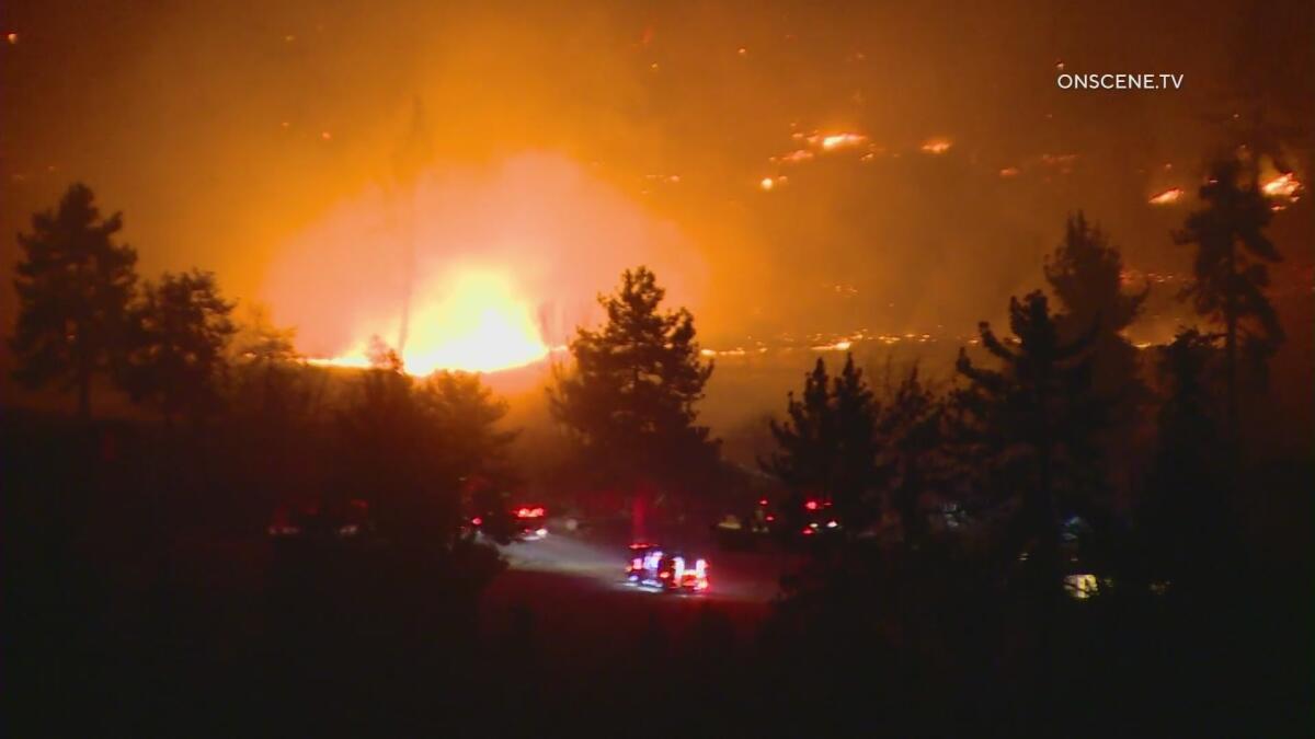 A wind-driven brush fire ignited in the San Jacinto Mountains early Friday.