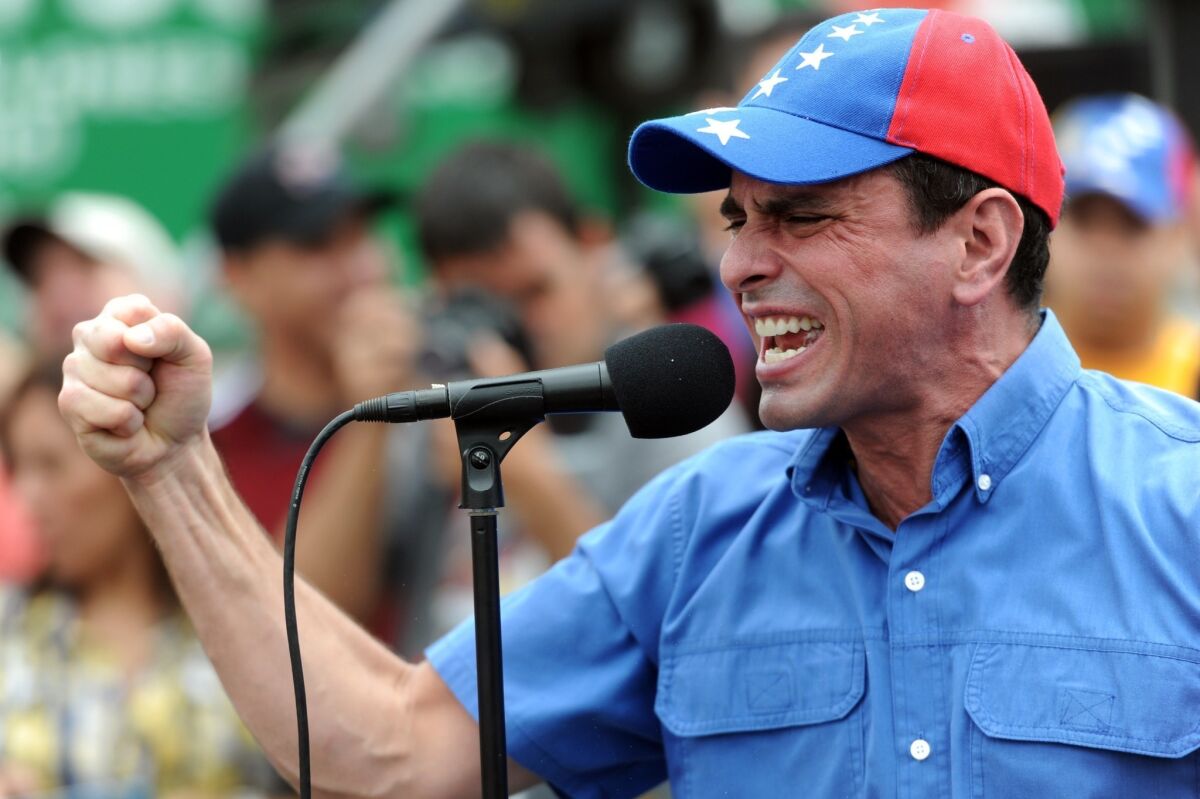 Venezuelan opposition leader Henrique Capriles delivers a speech during a protest against corruption in Caracas on Aug. 3, 2013.