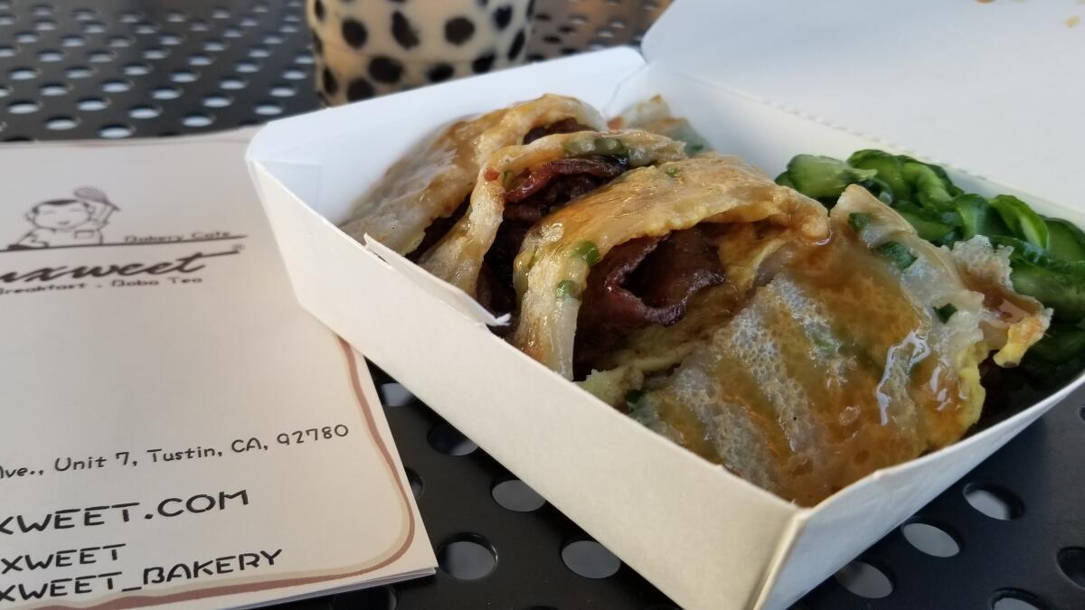 The house BBQ pork Taiwanese-style egg pancake at L'uxweet Bakery Cafe in Tustin.