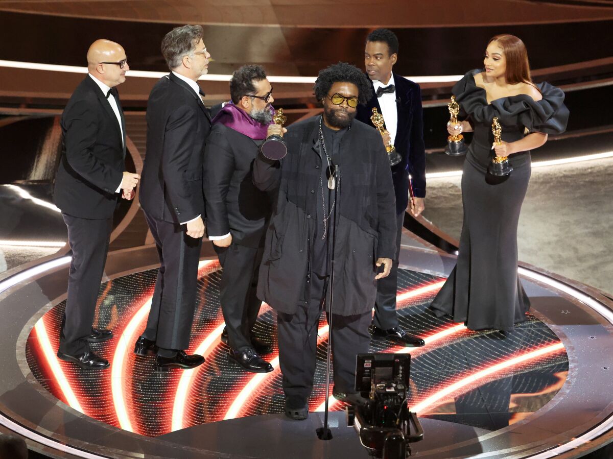 Questlove accepts the documentary feature award for "Summer of Soul" at the 2022 Oscars.