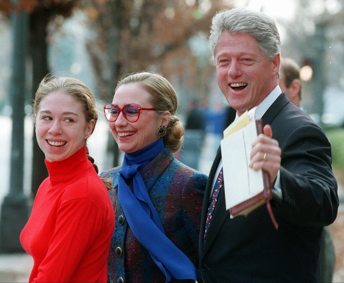President Clinton, First Lady Hillary Rodham Clinton and their daughter, Chelsea, leave the Foundry Methodist Church in Washington after services on Dec. 24, 1995.