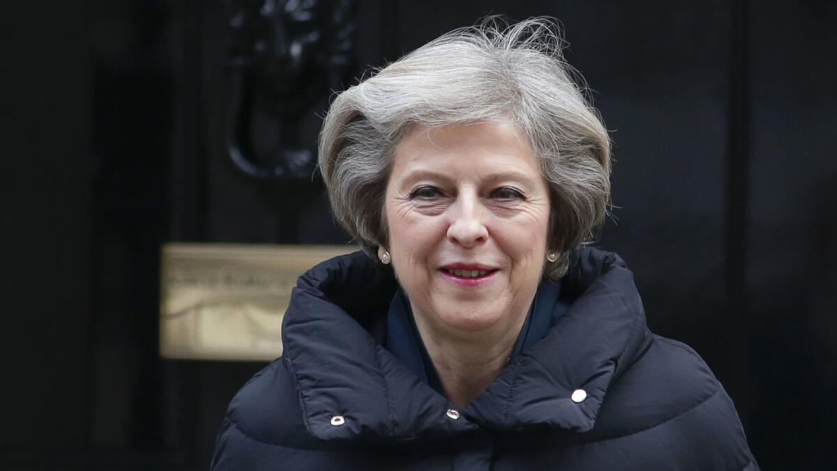 British Prime Minister Theresa May, shown leaving No. 10 Downing St. in London last week, is expected on Tuesday to outline Britain's plan for leaving the European Union.