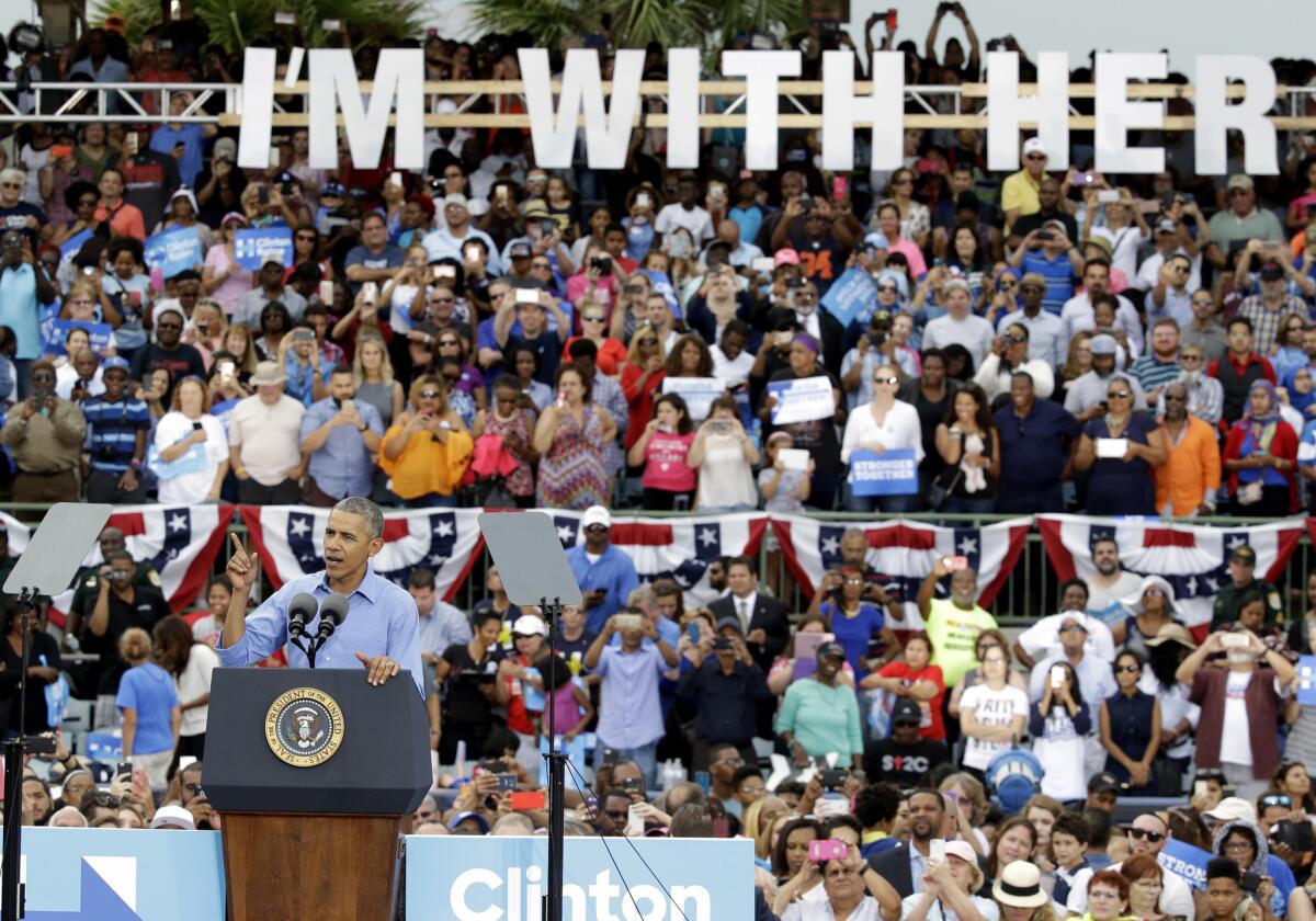 President Obama speaks at a campaign rally for Hillary Clinton in Kissimmee, Fla. on Sunday.