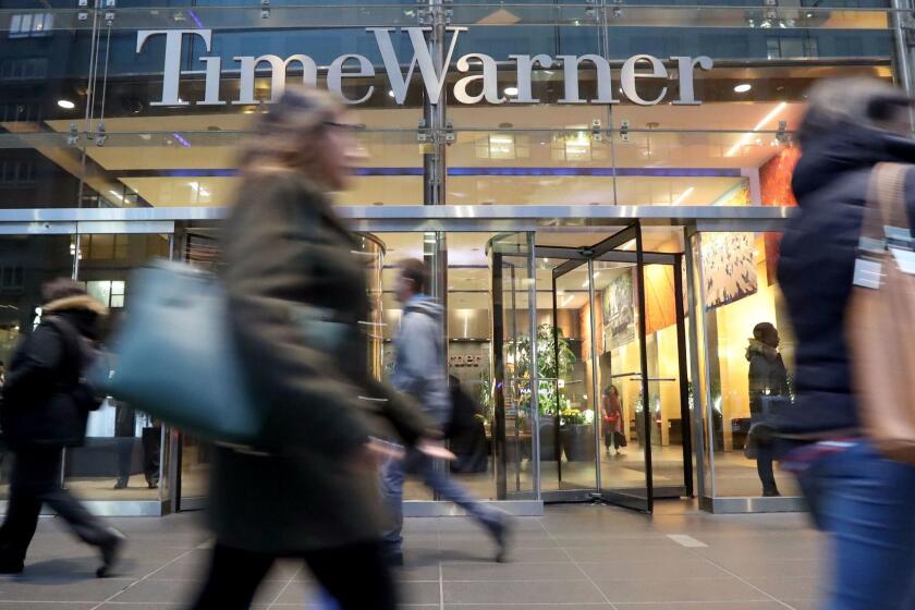 Mandatory Credit: Photo by ANDREW GOMBERT/EPA-EFE/REX/Shutterstock (9212909a) A view of the Time Warner offices in New York, New York, USA, 08 November 2017. Reports state that The US Department of Justice has told AT&T and Time Warner to sell Turner Broadcasting, the group of cable channels which includes CNN as a possible requirement for approving the 85.4 billion US dollar merger deal. A view of the Time Warner offices in New York, USA - 08 Nov 2017 ** Usable by LA, CT and MoD ONLY **