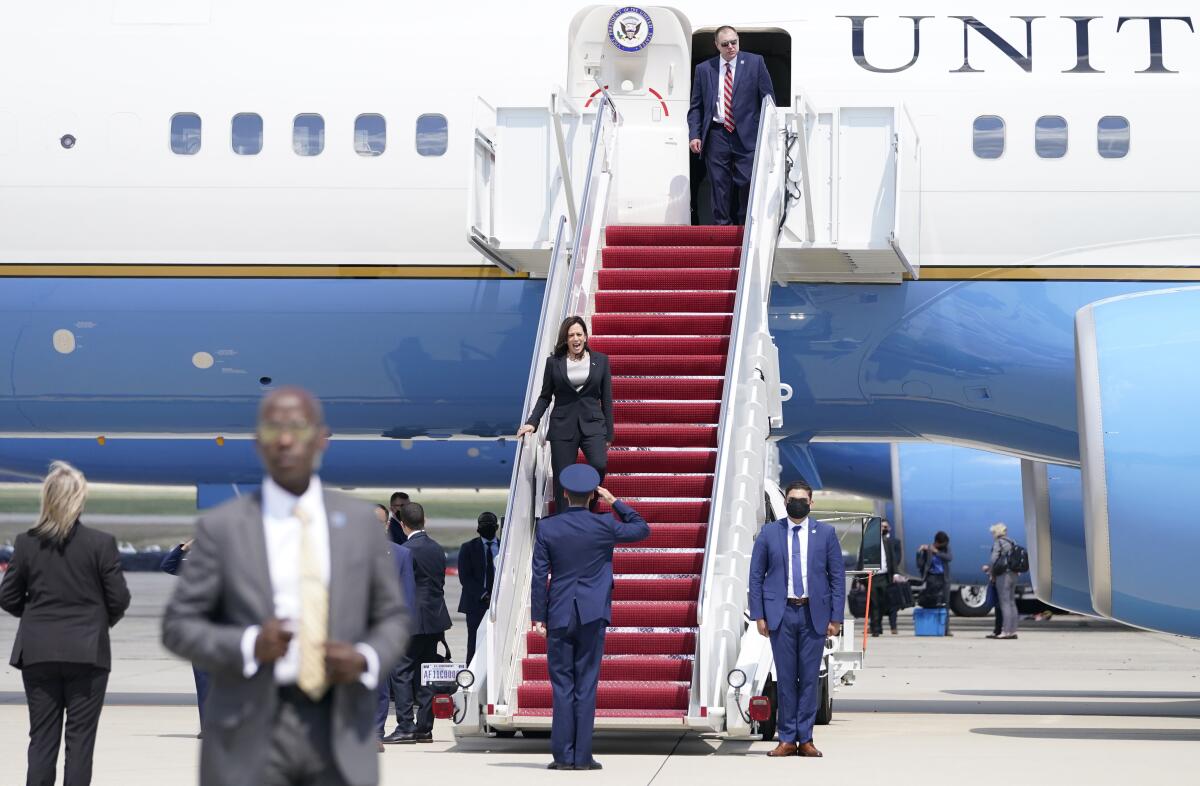 Vice President Kamala Harris deplanes Air Force Two.