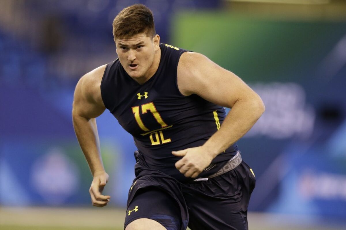 Indiana offensive lineman Dan Feeney runs a drill at the NFL football scouting combine in Indianapolis on March 3.