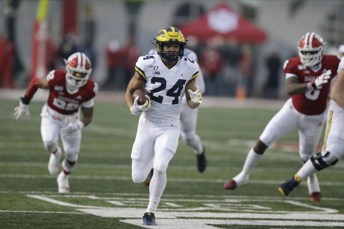 Michigan running back Zach Charbonnet carries the ball during a game against Indiana on Nov. 23, 2019, in Bloomington, Ind.
