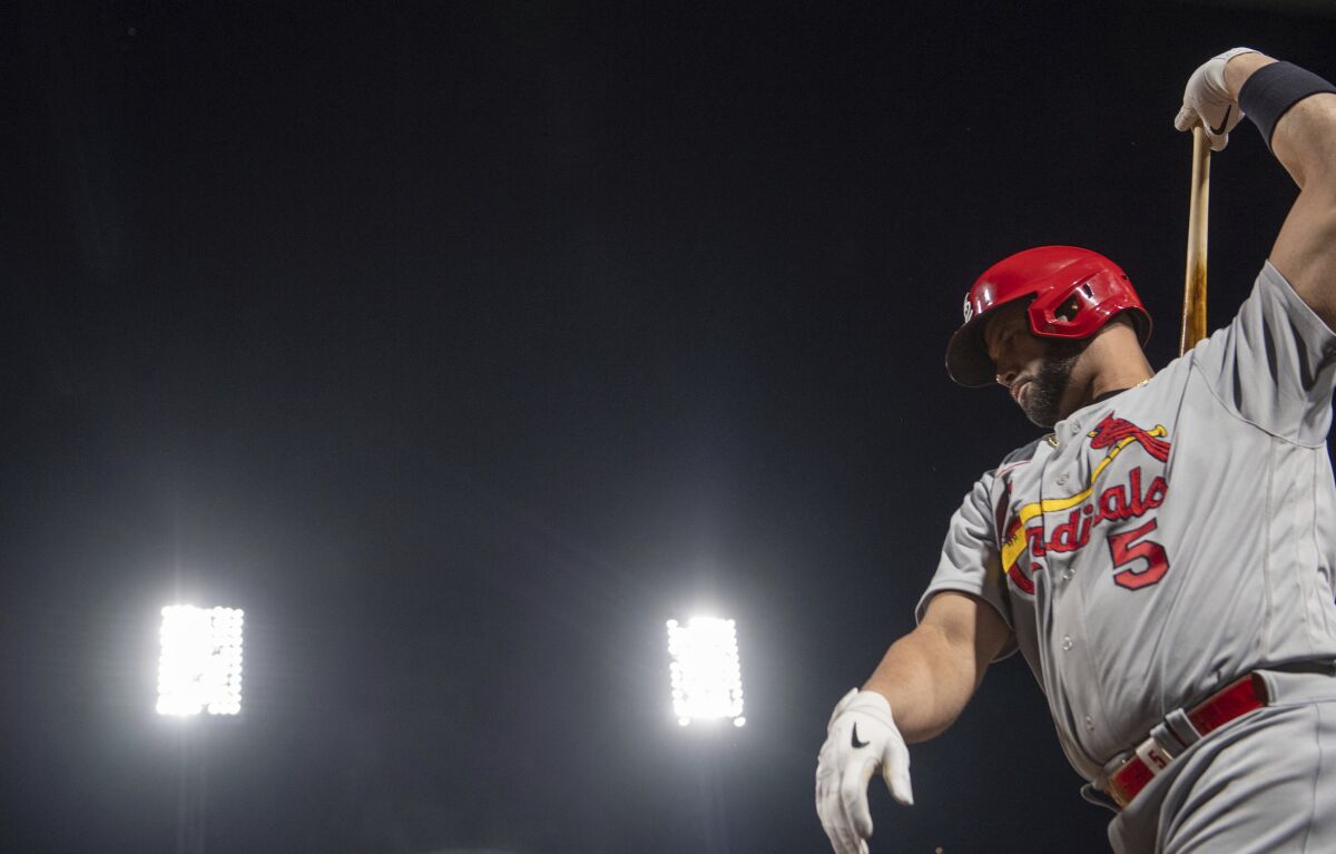The Cardinals' Albert Pujols warms up before stepping up to the plate on Monday, Oct. 3, 2022, at a baseball game against the Pittsburgh Pirates in Pittsburgh. (Emily Matthews/Pittsburgh Post-Gazette via AP)