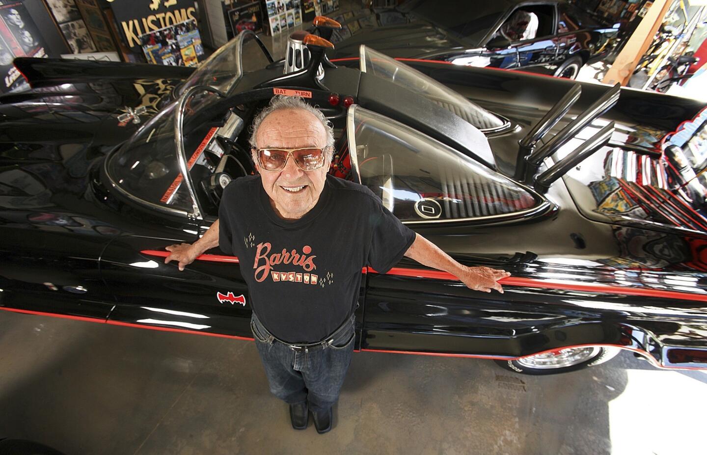 Car customizer George Barris, 87, stands next to the original Batmobile at Barris Kustom Industries in North Hollywood. Barris designed the car for the 1966 television show "Batman," which starred Adam West and Burt Ward.