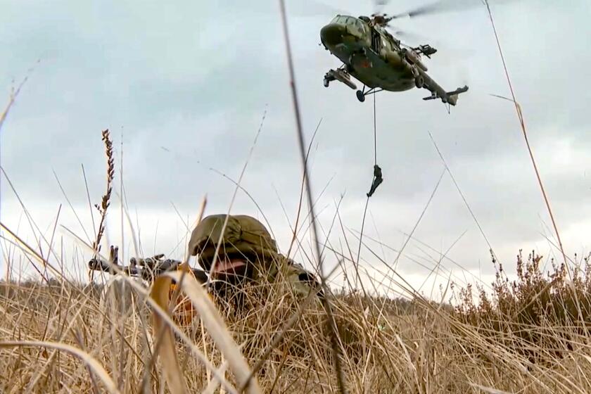 Soldiers train at the training ground in the Brest region in Belarus on Friday, Feb. 11, 2022.