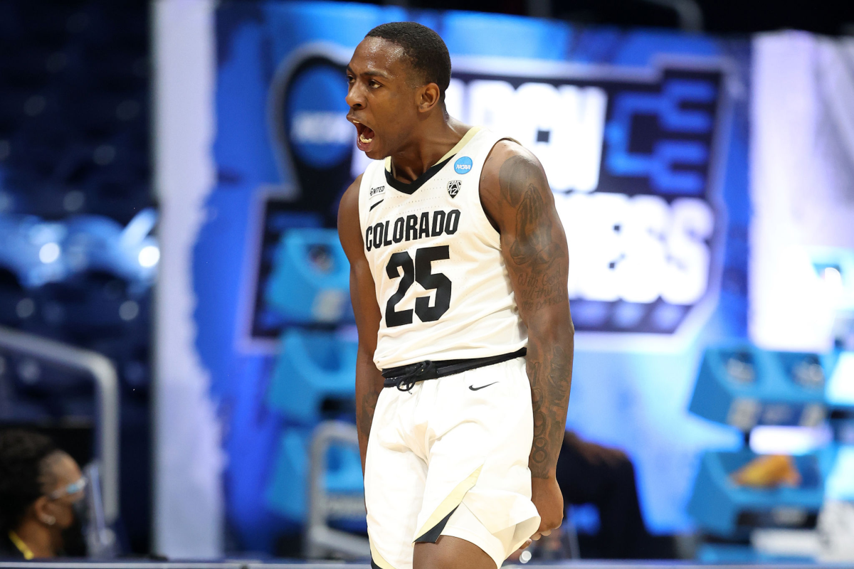 Colorado's McKinley Wright IV reacts after a play against Georgetown during Saturday's first-round game.