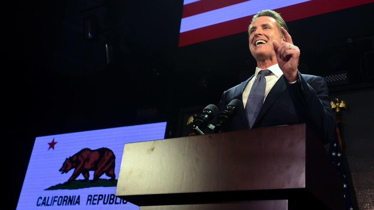 Gavin Newsom speaks onstage at his election night watch party in Los Angeles on Nov. 6.