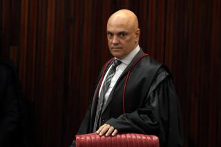 FILE - Brazilian Supreme Court Chief Justice Alexandre de Moraes arrives for a court hearing, in Brasilia, Brazil, June 22, 2023. (AP Photo/Eraldo Peres, File)