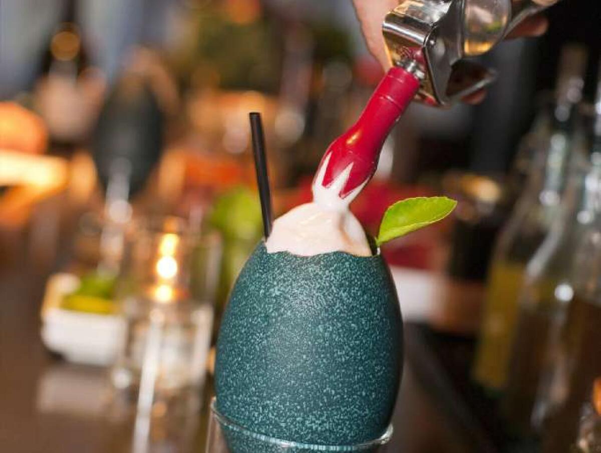 Matthew Biancaniello creates cocktails using emu eggs. This one is the Indian Summer, with cucumber, curry leaves, gin and cherry foam.