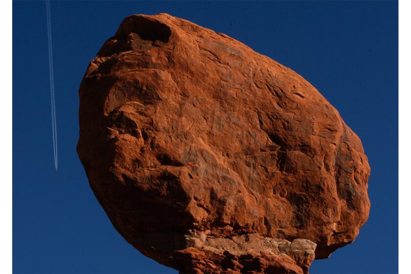 Balanced Rock, a popular stop at Arches National Park in Utah, is a tipsy-looking formation that has been carved by the elements for thousands of years.