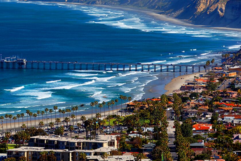 Real estate with coastal views and close proximity to beaches is especially coveted in La Jolla, California. Pictured is one of the local landmarks, Ellen Browning Scripps Memorial Pier. As one of the world's biggest research piers, Scripps Pier is used for boat launching and a variety of experiments conducted by Scripps Institution of Oceanography.