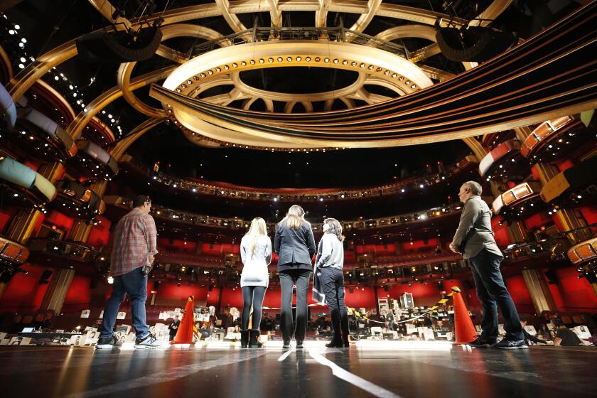 HOLLYWOOD, CA - FEBRUARY 6, 2020 Stage Managers John Esposito, left and Gary Natoli, right, direct rehearsal stand-ins Rochelle Rudolph, Bernadette Guckin and Terri Minton, left to right, as the production team rehearses on stage in the Dolby Theatre for the 92nd Oscars show as preparations continue for the Academy Awards this Sunday, February 9, 2020. (Al Seib / Los Angeles Times)