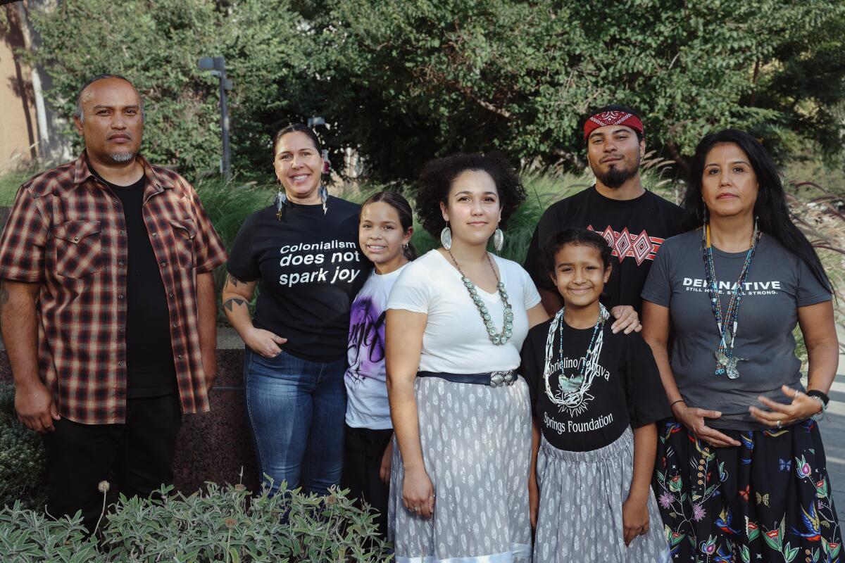 A group of people pose for a photo.