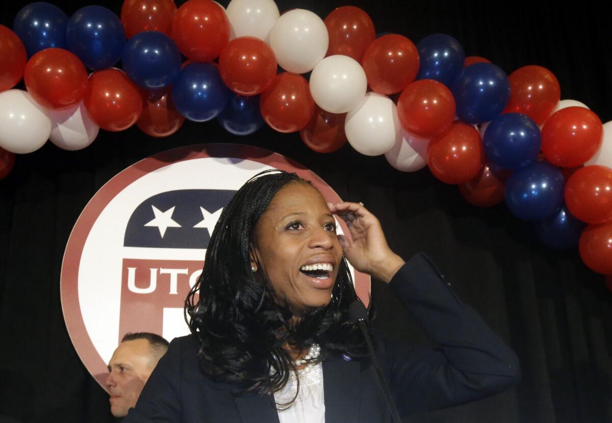 Republican Mia Love celebrates with her supporters after winning the race for Utah's 4th Congressional District.