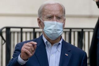 Democratic presidential candidate Joe Biden fields media questions in Wilmington, Del., On Saturday.