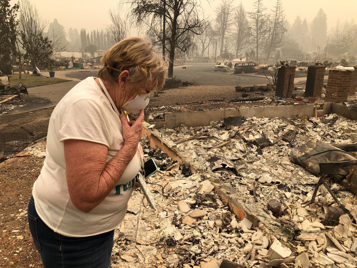 Susie McMillan, 76, evacuated before a wildfire destroyed her home on Orchard Place in Phoenix, Ore.