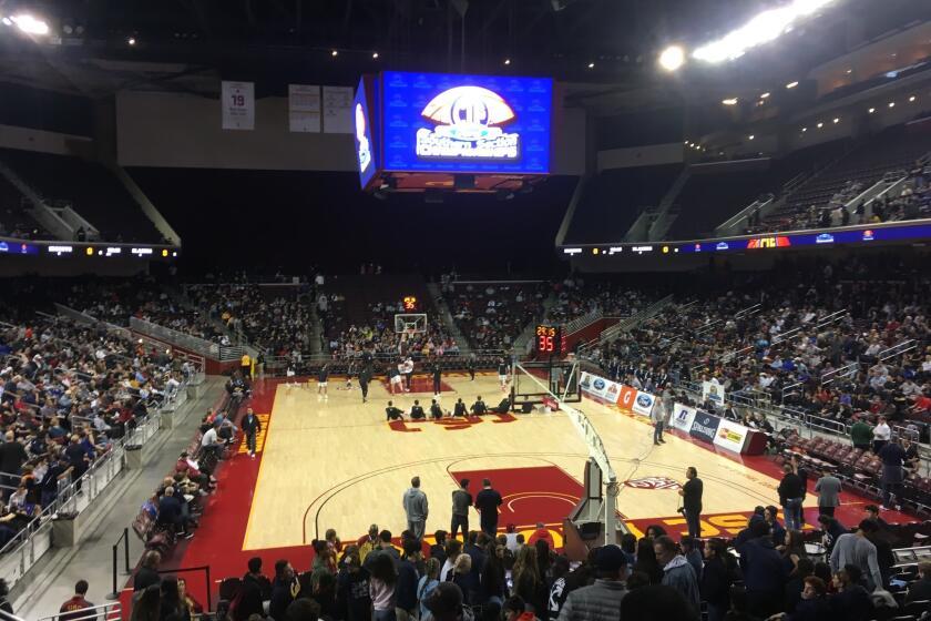 Fans filling in to sold-out Galen Center for high school basketball.